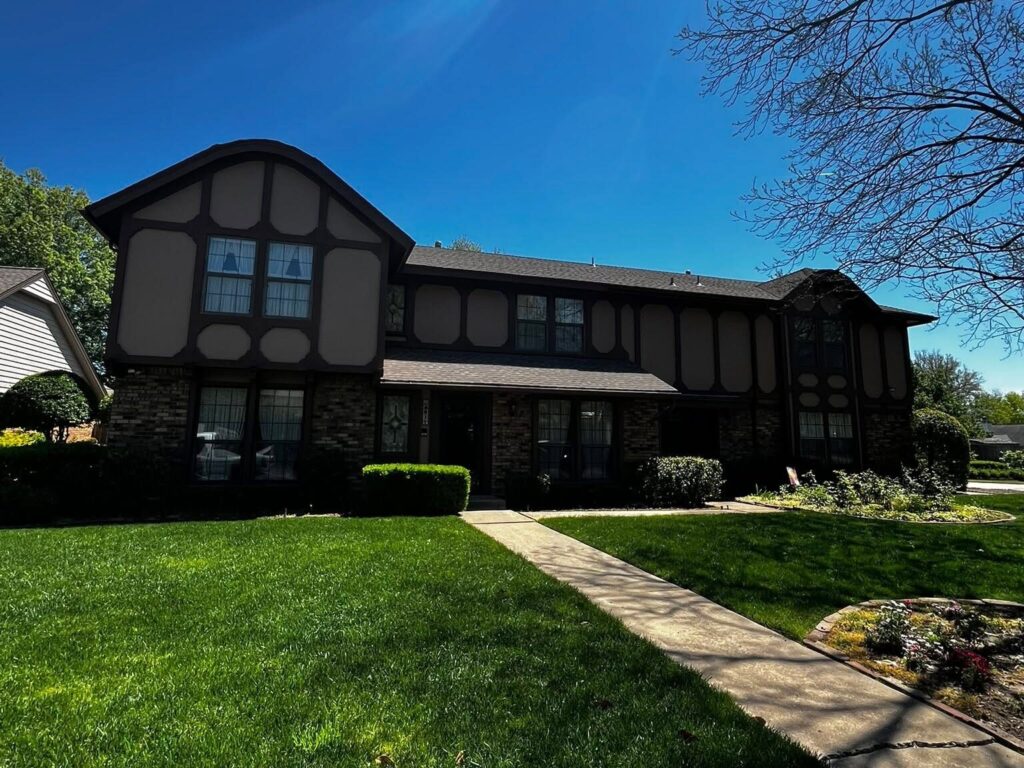 Completed roof on a Tudor-style two-story home
